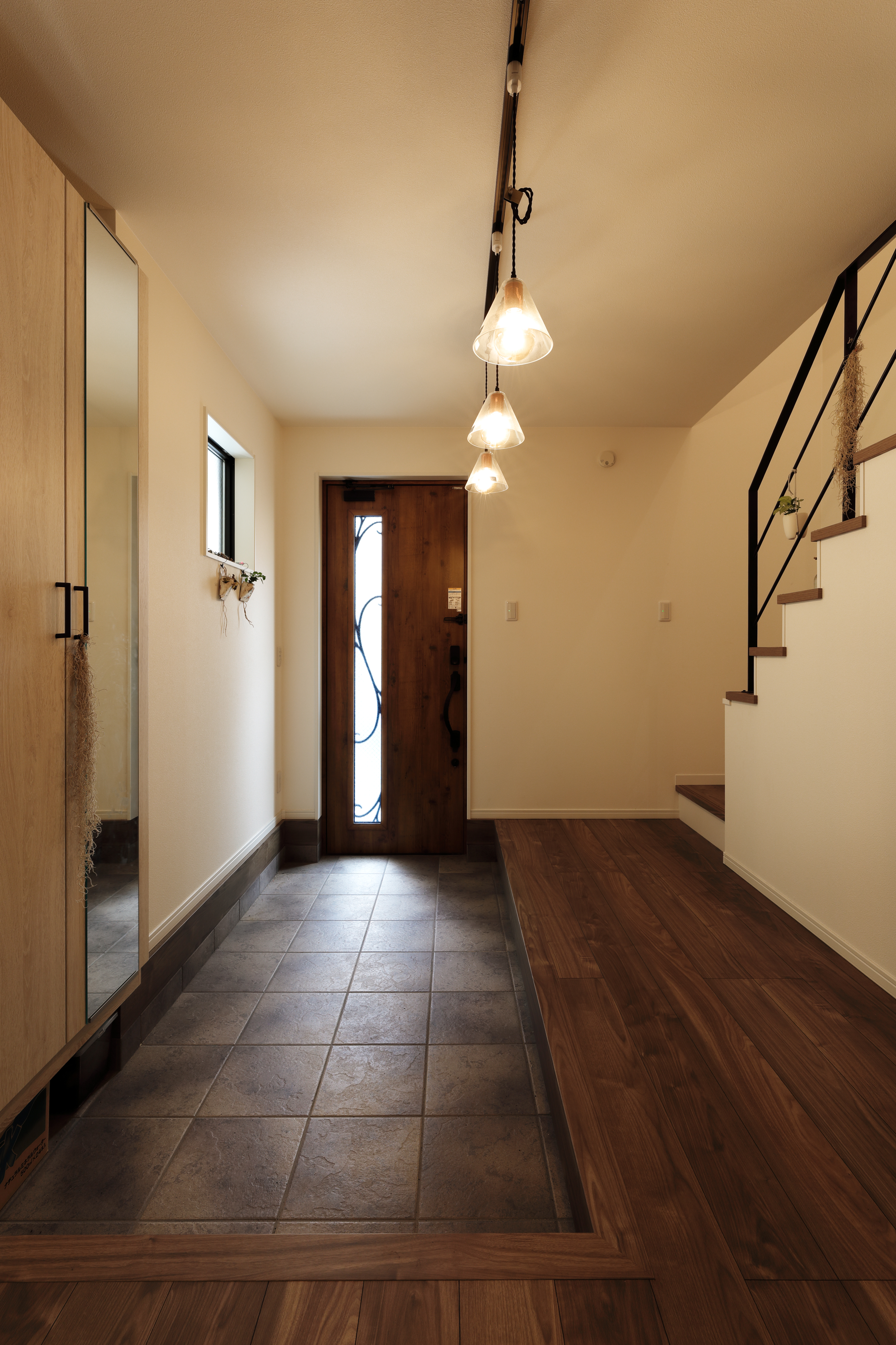 ハンモック、ホームシアターのある遊び心満点の家 写真